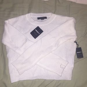 Cream colored sweater crop top.